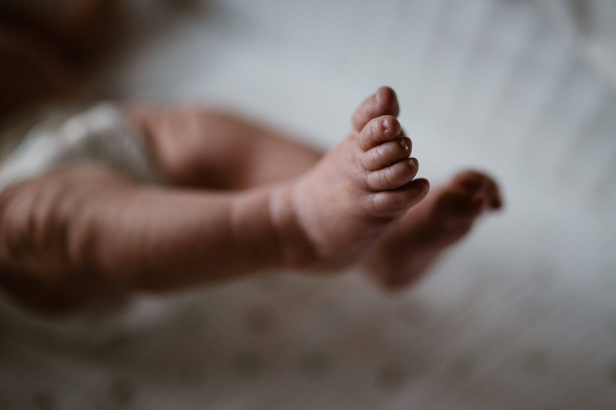 Close up of newborn toes.